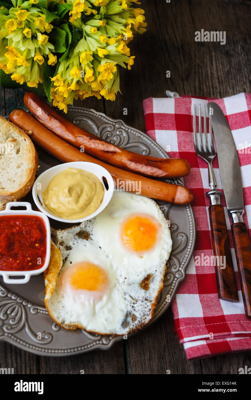 Lunch time with eggs and fried sausages Stock Photo Alamy