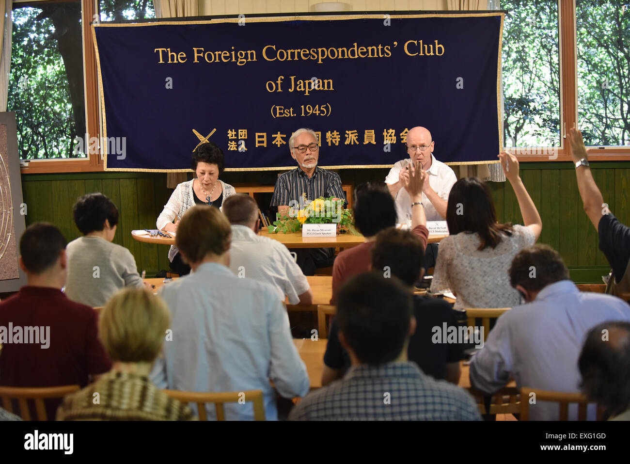 Tokyo, Japan. 13th July, 2015. Japan's Oscar-awarded animator Hayao Miyazaki (C, rear) attends a press conference at the Foreign Correspondents' Club of Japan in Tokyo, Japan, on July 13, 2015. Hayao Miyazaki Monday urged the Japanese government to follow the country 's 70-year pacifism since the end of World War II by dropping a plan to build a replacement within Okinawa for a controversial U.S. airbase and a security-related legislation package to allow Japan' s defense forces to exercising the right to collective defense. © Foreign Correspondents' Club of Japan/Xinhua/Alamy Live News Stock Photo