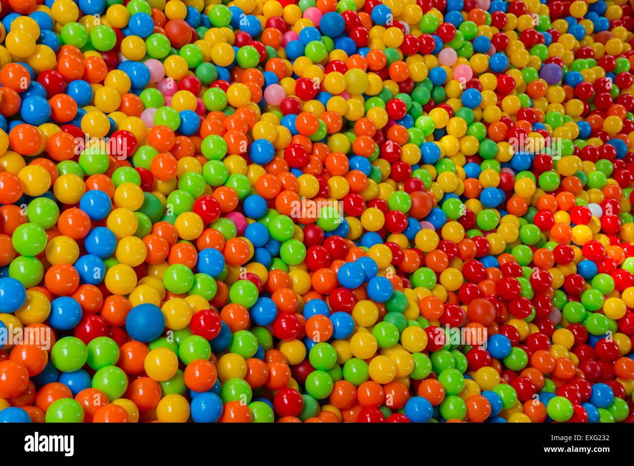 lots of colored balls in a playground ball pool Stock Photo - Alamy
