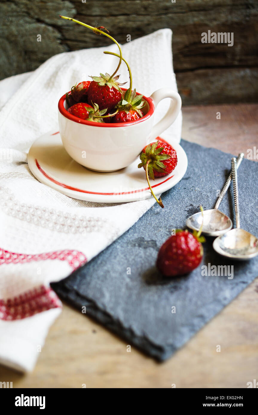 Fresh strawberries on the old wooden background Stock Photo - Alamy