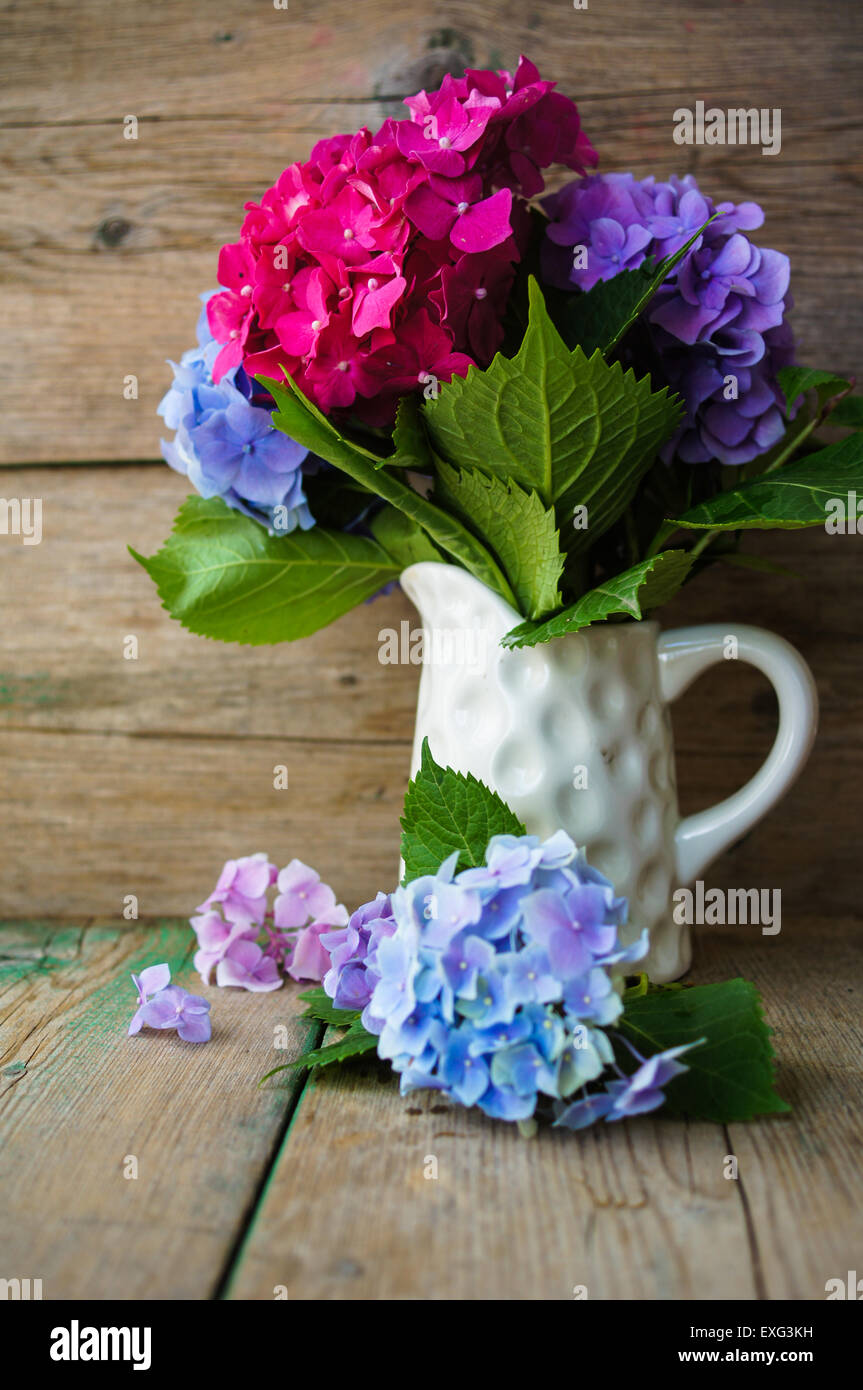 Pastel color hydrangea flowers on wooden table Stock Photo Alamy
