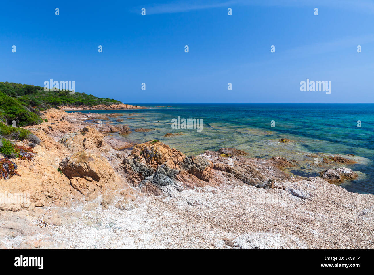 Coastal landscape with rocky wild beach, Corsica, France. Plage De Capo Di Feno Stock Photo