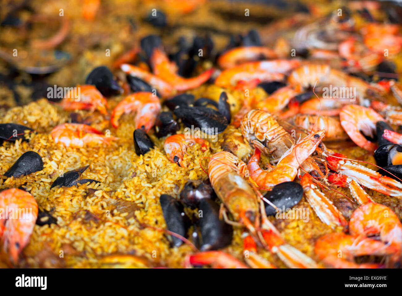 Traditional paella with seafood in a market. Shoted at Provence, France. Shot with selective