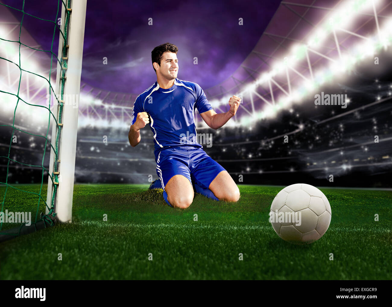 soccer ball on the field near a goal Stock Photo Alamy