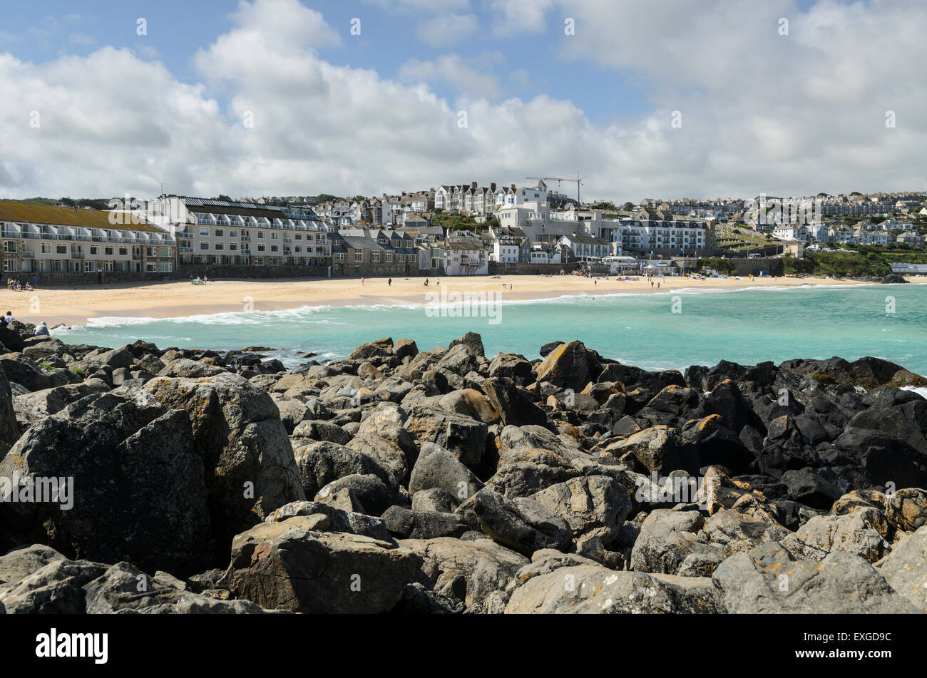 Porthmeor Beach, Cornwall,England, UK hosts holiday apartments, artists studios, cafes and The Tate Gallery. Stock Photo