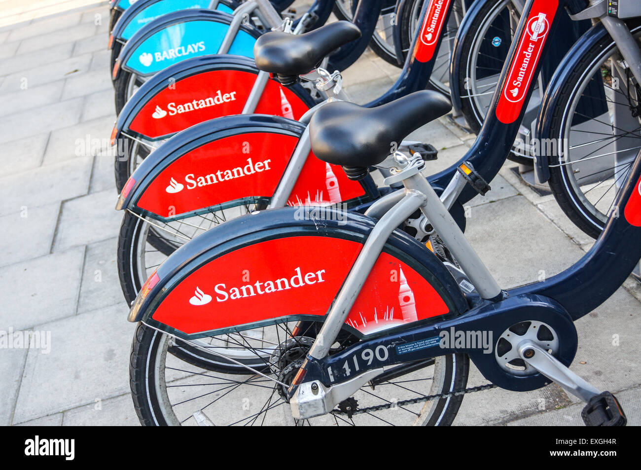 'Boris bikes' urban cycle rental scheme bicycles at a rental station in Stockwell, London, England Stock Photo