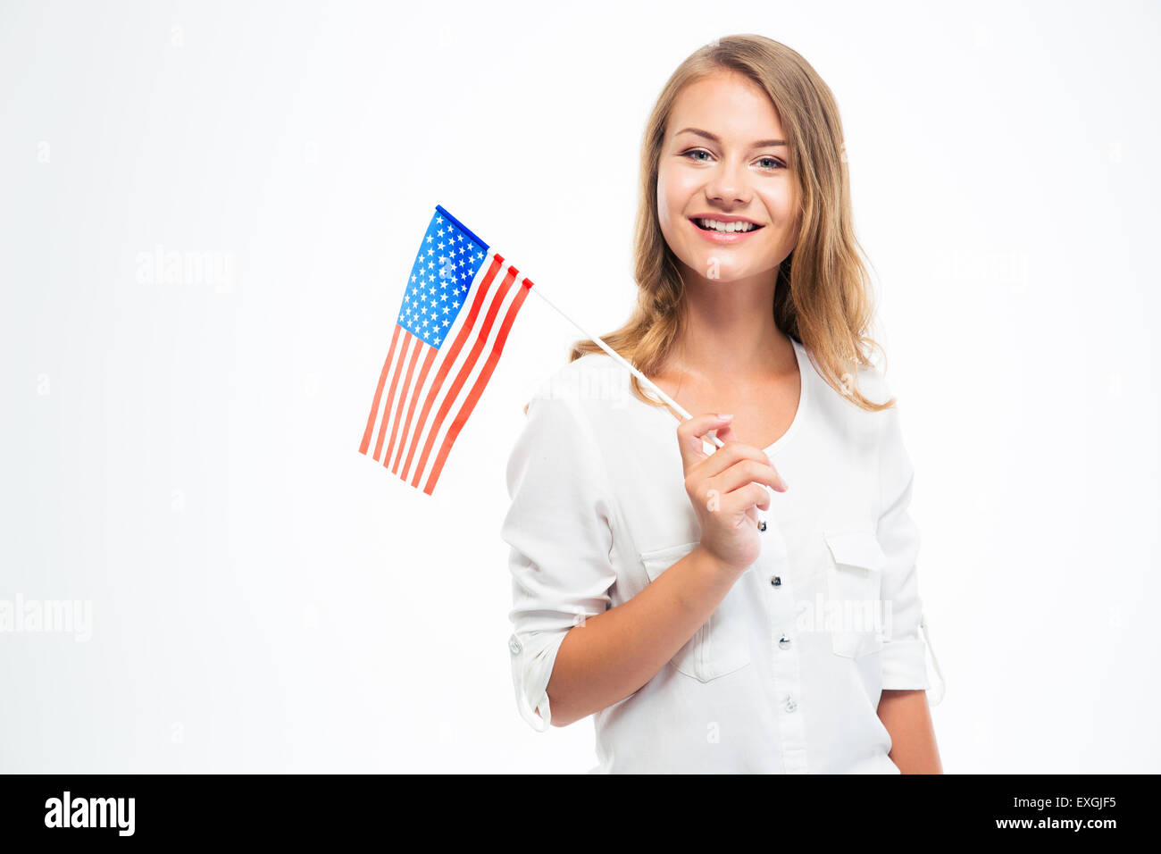 Happy young girl holding USA flag isolated on a white background Stock ...