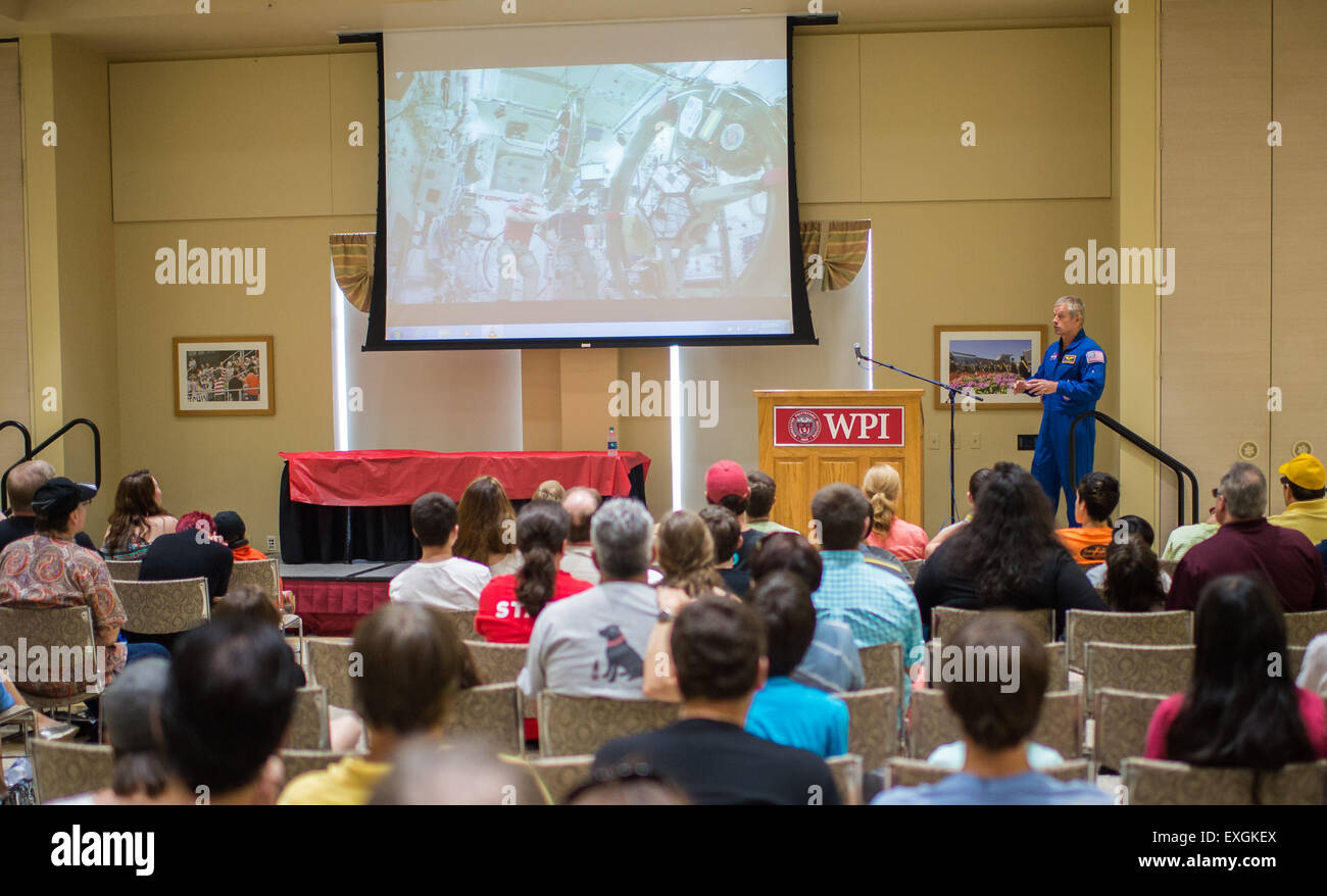 NASA astronaut Steve Swanson speaks about his time aboard the International Space Station during the TouchTomorrow Festival, held in conjunction with the 2015 Sample Return Robot Challenge, Saturday, June 13, 2015 at the Worcester Polytechnic Institute (WPI) in Worcester, Mass.  Sixteen teams competed for a $1.5 million NASA prize purse. Teams will be required to demonstrate autonomous robots that can locate and collect samples from a wide and varied terrain, operating without human control. The objective of this NASA-WPI Centennial Challenge is to encourage innovations in autonomous navigatio Stock Photo