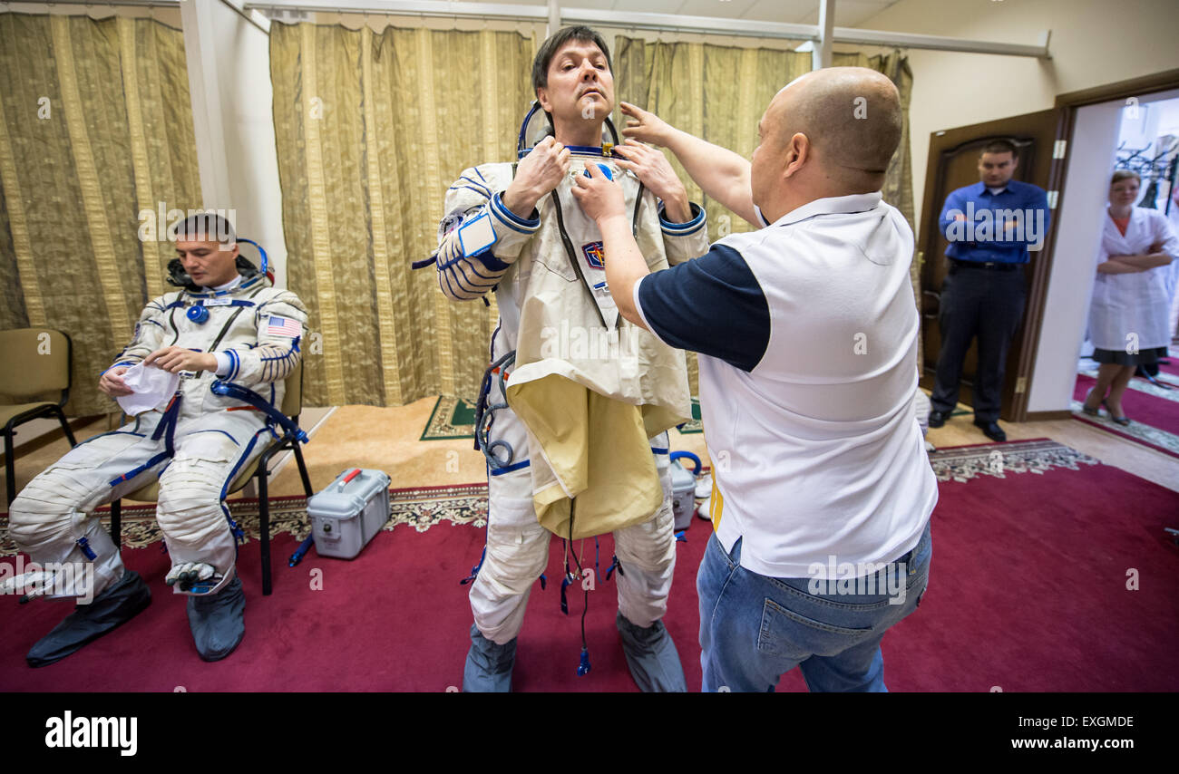 NASA astronaut Kjell Lindgren, left, Russian cosmonaut Oleg Kononenko, right, and Japan Aerospace Exploration Agency astronaut Kimiya Yui participate in the second day of qualification exams, Thursday, May 7, 2015 at the Gagarin Cosmonaut Training Center (GCTC) in Star City, Russia. The Expedition 44/45 trio is preparing for launch to the International Space Station in their Soyuz TMA-17M spacecraft from the Baikonur Cosmodrome in Kazakhstan. Stock Photo