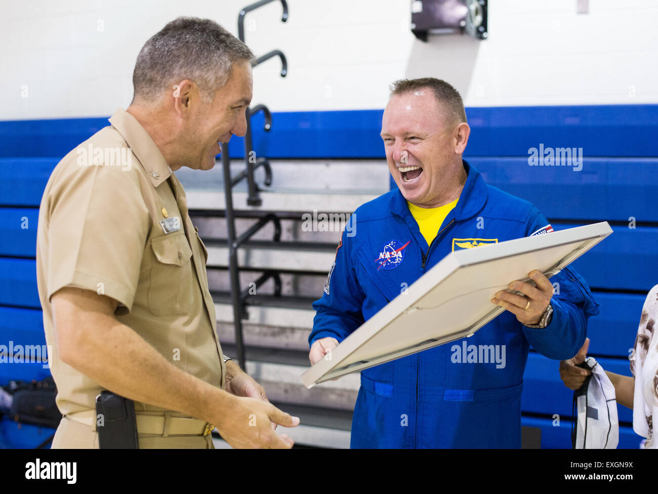 Astronaut Barry &quot;Butch&quot; Wilmore presents Installation Commander Captain Frank Mays with a plaque from the Expedition 42 crew June 24, 2015 at Joint Base Anacostia-Bolling in Washington, DC. Stock Photo