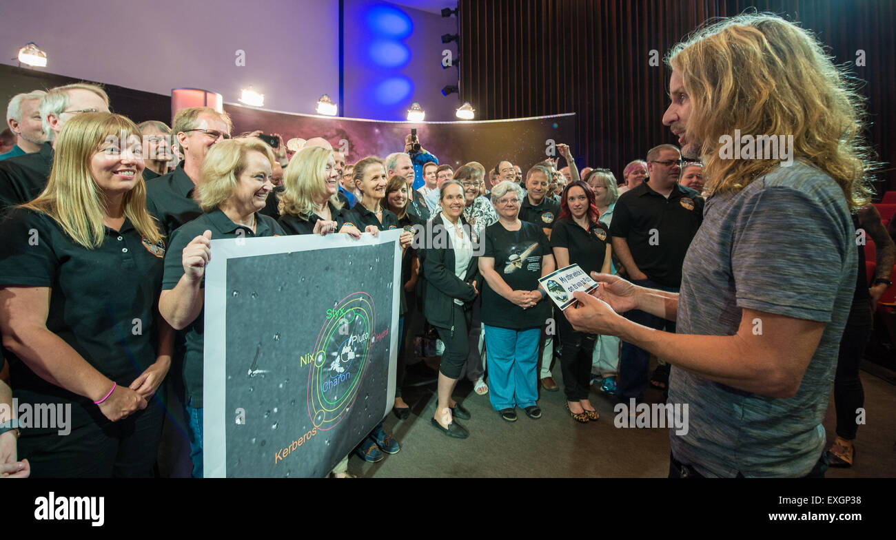 Tommy Shaw, of the band Styx, visits with New Horizons team members in the Kossiakoff Conference and Education Center, Wednesday, July 1, 2015 at The Johns Hopkins University Applied Physics Laboratory in Laurel, Md.  Members of the band Styx visited with New Horizons team members and Mark Showalter, who discovered Pluto's fifth moon, Styx, in July of 2012. Stock Photo