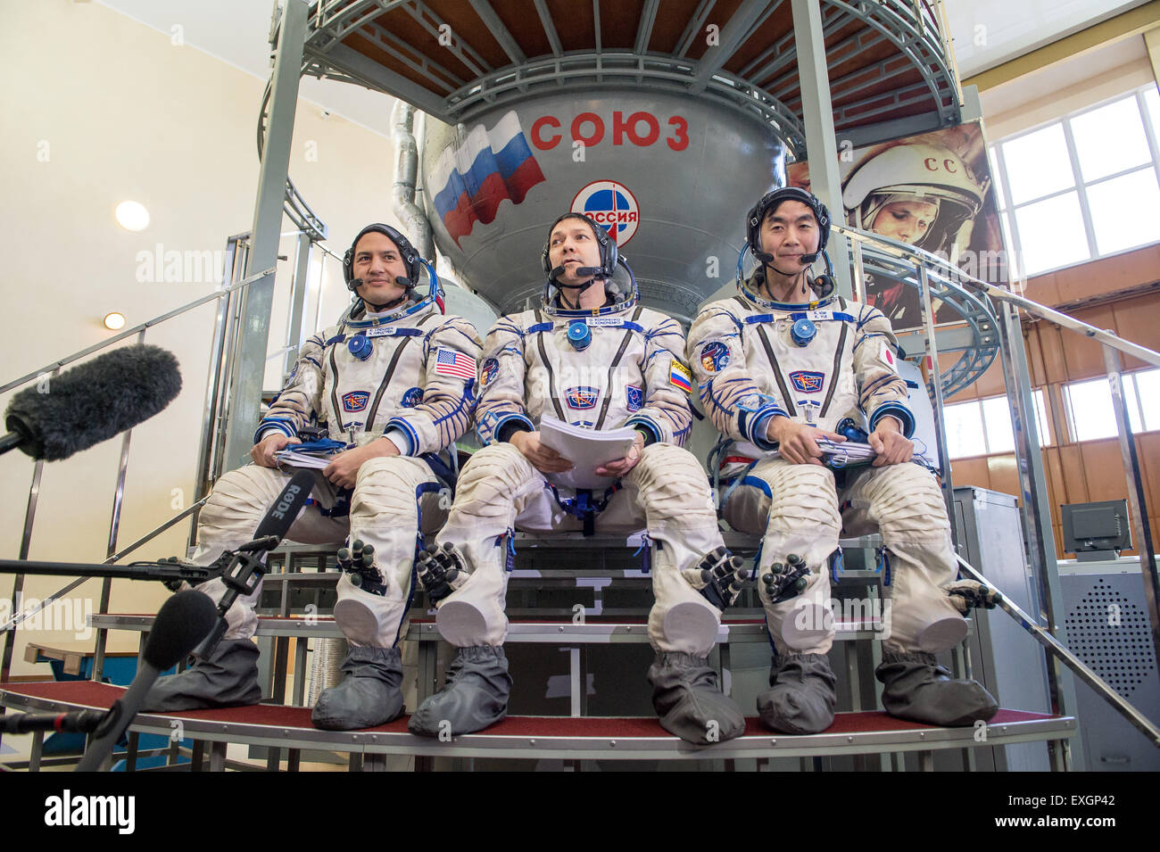 NASA astronaut Kjell Lindgren, left, Russian cosmonaut Oleg Kononenko, center, and Japan Aerospace Exploration Agency astronaut Kimiya Yui participate in the second day of qualification exams, Thursday, May 7, 2015 at the Gagarin Cosmonaut Training Center (GCTC) in Star City, Russia. The Expedition 44/45 trio is preparing for launch to the International Space Station in their Soyuz TMA-17M spacecraft from the Baikonur Cosmodrome in Kazakhstan. Stock Photo