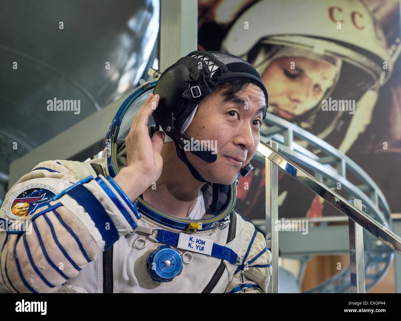 Japan Aerospace Exploration Agency astronaut Kimiya Yui listens to a report's question during the second day of qualification exams with NASA astronaut Kjell Lindgren and Russian cosmonaut Oleg Kononenko, Thursday, May 7, 2015 at the Gagarin Cosmonaut Training Center (GCTC) in Star City, Russia. The Expedition 44/45 trio is preparing for launch to the International Space Station in their Soyuz TMA-17M spacecraft from the Baikonur Cosmodrome in Kazakhstan. Stock Photo