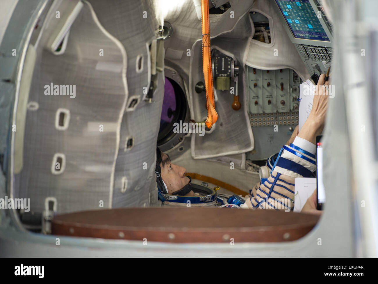 Japan Aerospace Exploration Agency astronaut Kimiya Yui participates in the second day of qualification exams with Russian cosmonaut Oleg Kononenko and NASA astronaut Kjell Lindgren, Thursday, May 7, 2015 at the Gagarin Cosmonaut Training Center (GCTC) in Star City, Russia. The Expedition 44/45 trio is preparing for launch to the International Space Station in their Soyuz TMA-17M spacecraft from the Baikonur Cosmodrome in Kazakhstan. Stock Photo