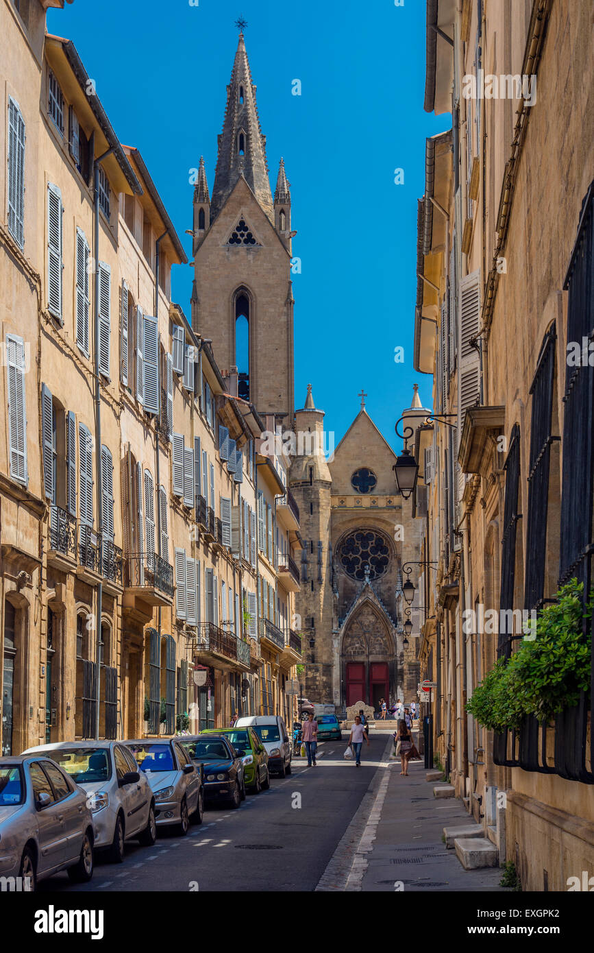 Street in the historical Quartier Mazarin district with St. Jean de Malte church in the background, Aix-en-Provence, France Stock Photo