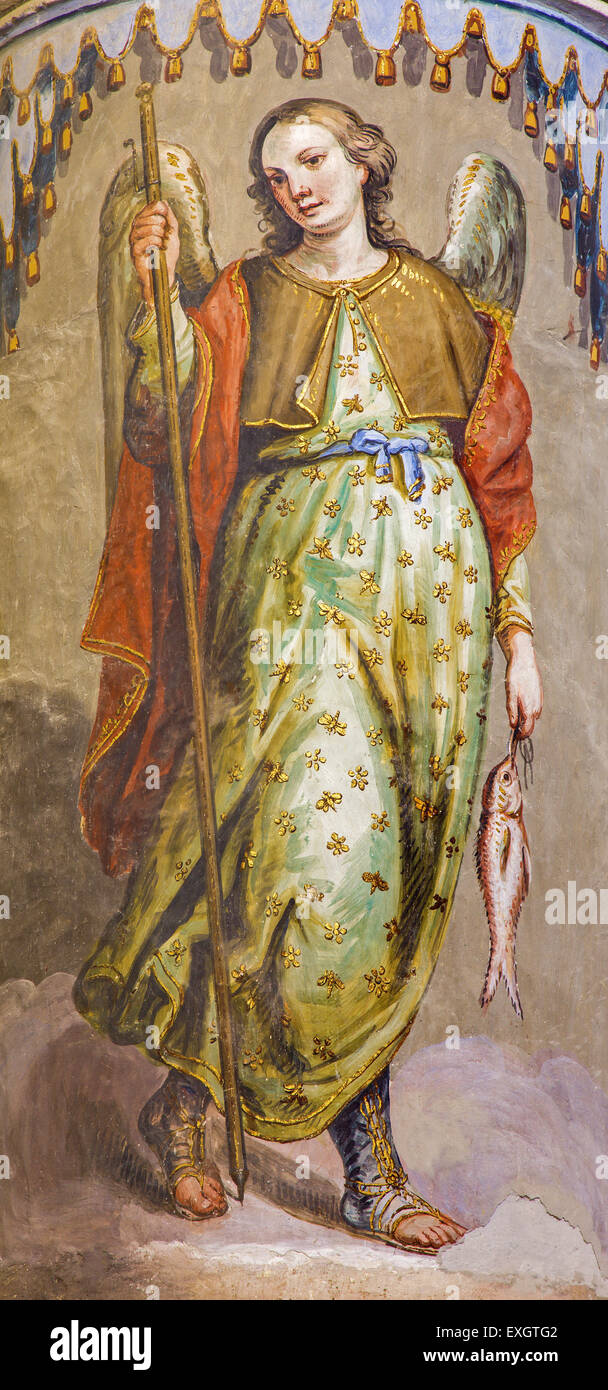 GRANADA, SPAIN - MAY 29, 2015: The baroque fresco of archangel Raphael in nave of church Monasterio de San Jeronimo by Juan de M Stock Photo