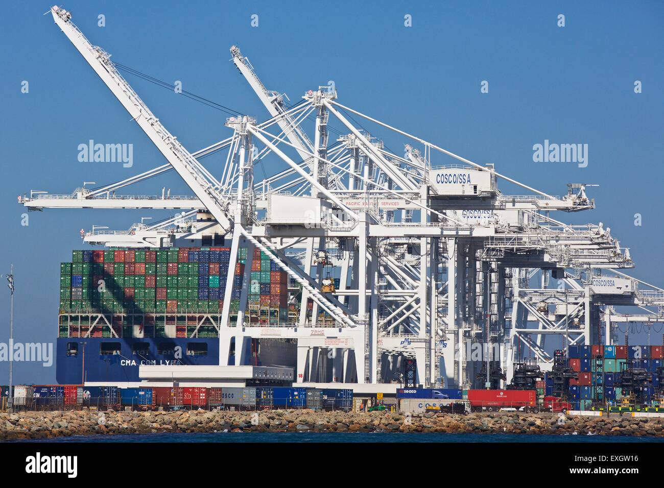 The Large Container Ship, CMA CGM Lyra, Unloading At The Long Beach Container Terminal, Los Angeles, California, USA. Stock Photo