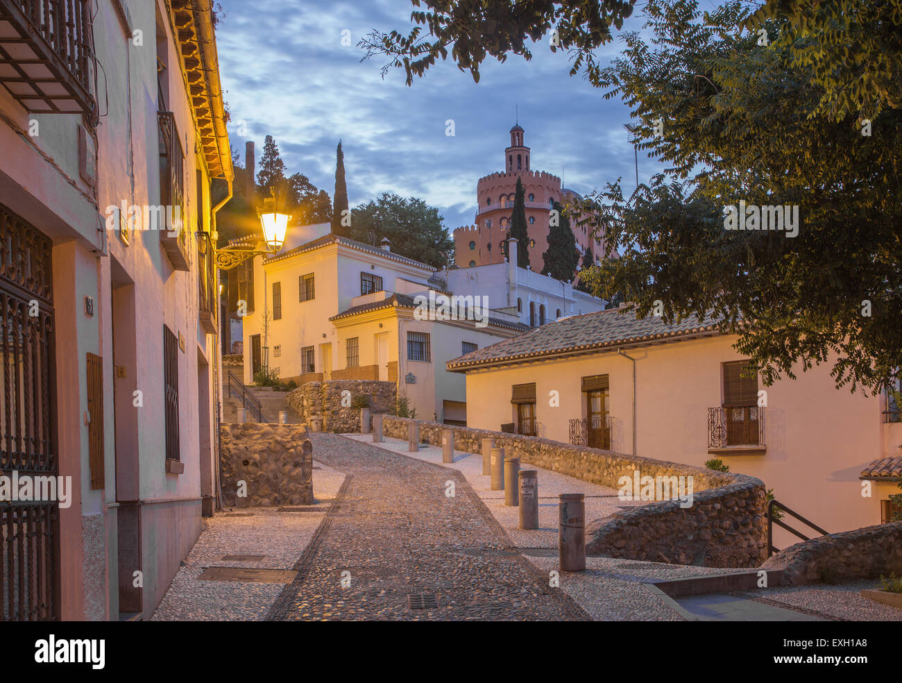 Granada - The ascent to Alhambra palace across the old street in morning dusk. Stock Photo