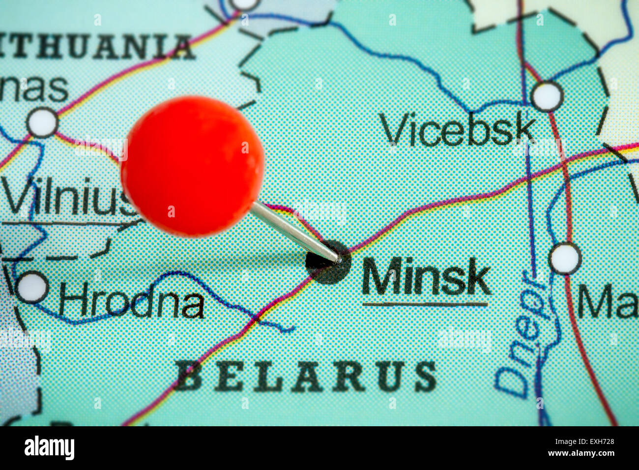 Close-up of a red pushpin on a map of Minsk, Belarus Stock Photo