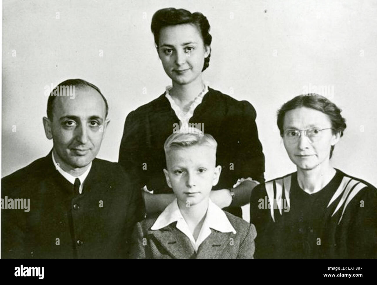 The Hershberger family, Guy F. and Clara, are pictured in 1947. Their family represents Mennonite values, community involvement, and service in the post-war period, as they contributed to both family life and broader Mennonite mission work during that era. Stock Photo