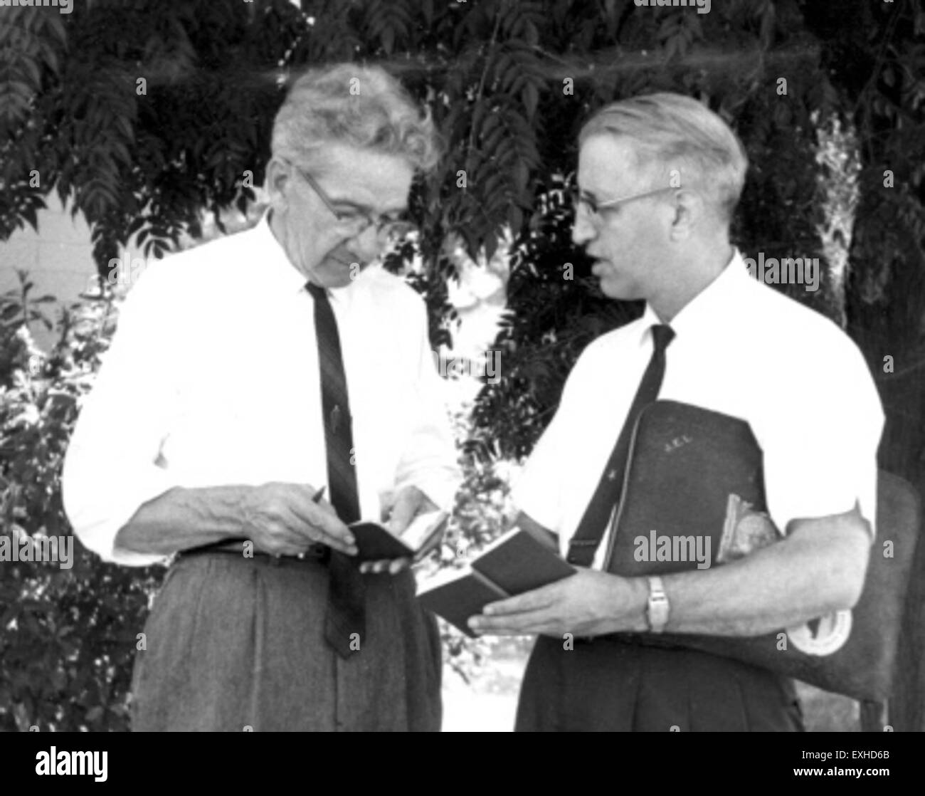Harold Lundgreen and John Lehman are shown working with migrant communities in Stanfield, Arizona. Their service is part of the Mennonite Board of Missions, focused on providing support for migrant families in the region. Stock Photo
