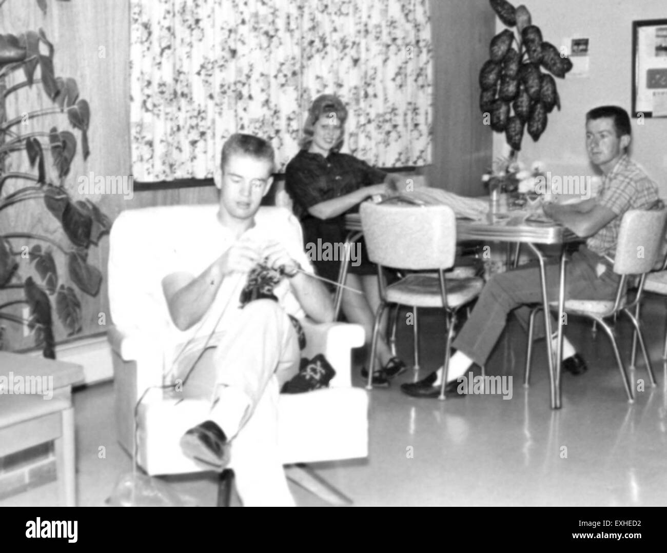 A photo of Jay Yoder knitting with Constance Liller and Lloyd Yutzy ...