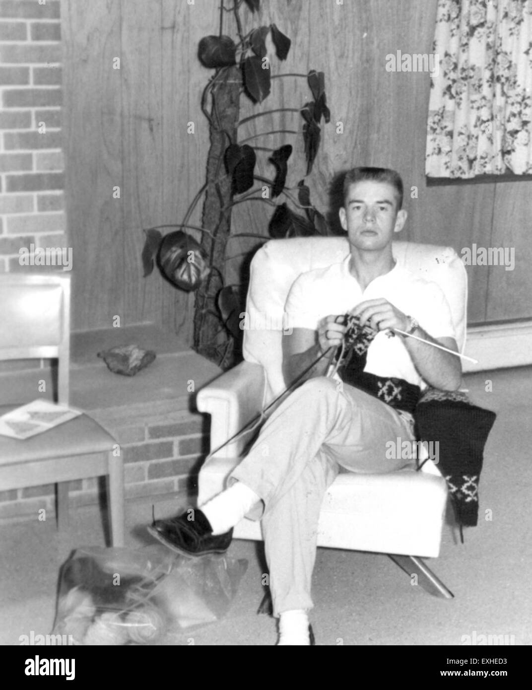 Jay Yoder is pictured with his knitting, engaging in a craft as part of ...