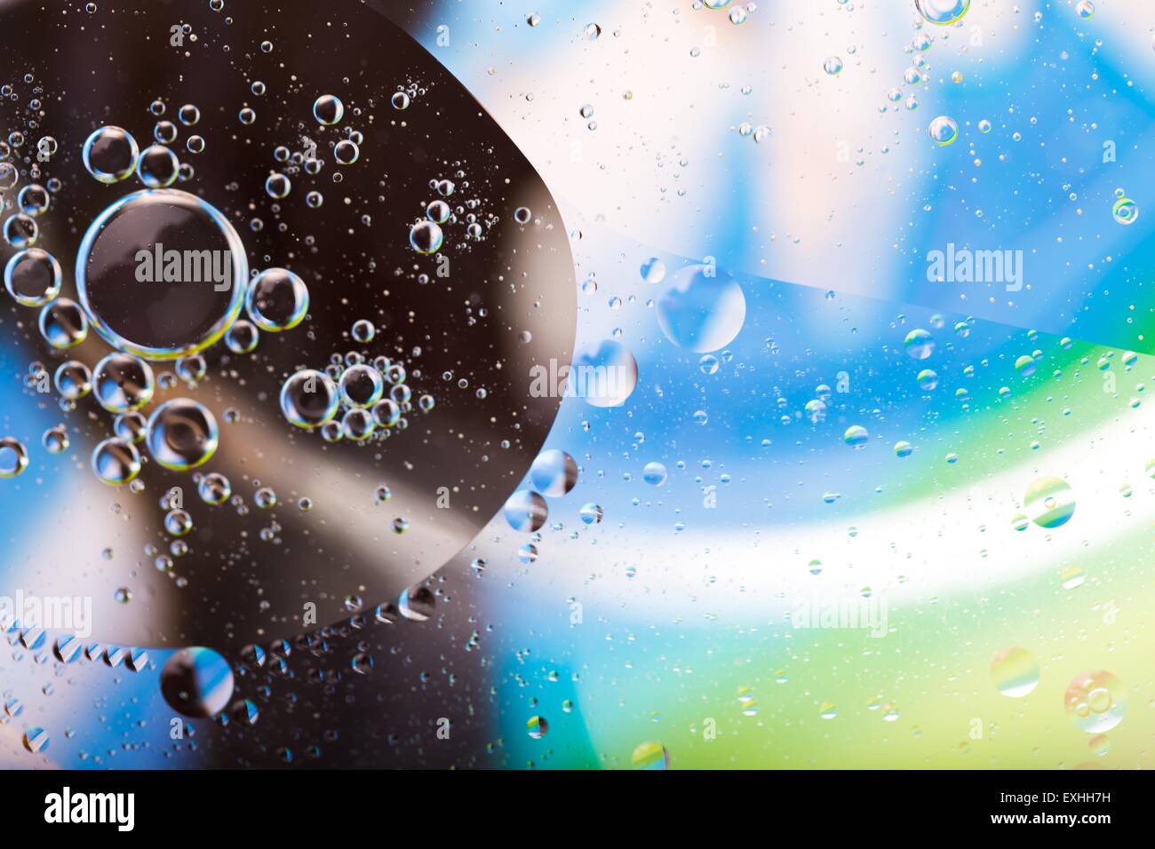 Abstract background of oil droplets on water surface. Beautiful and colorful macro abstraction Stock Photo