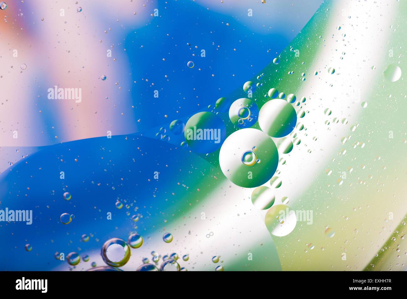 Abstract background of oil droplets on water surface. Beautiful and colorful macro abstraction Stock Photo