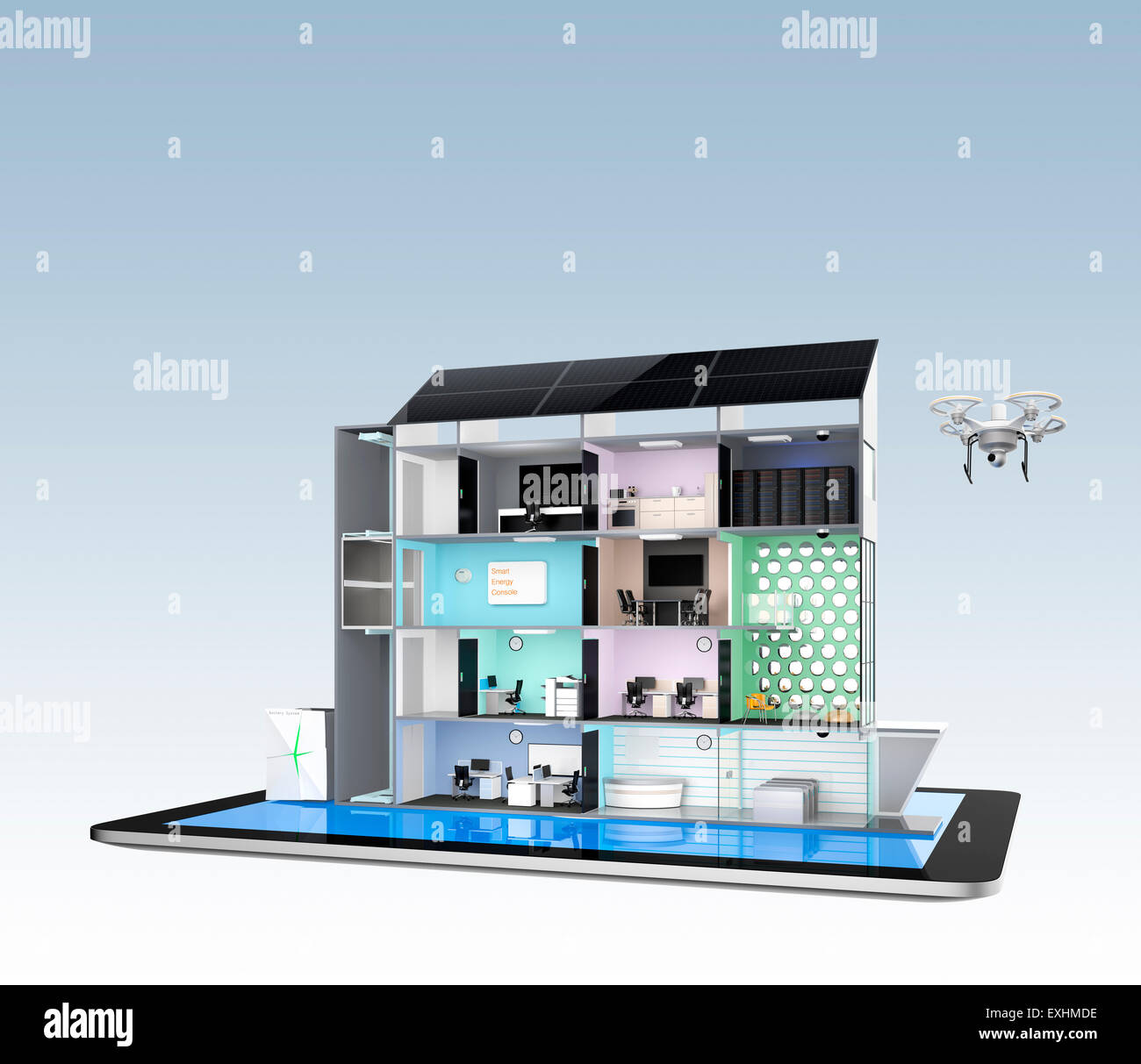 Smart office building model on a tablet PC. Energy support by solar panels and storage to module battery system. Stock Photo