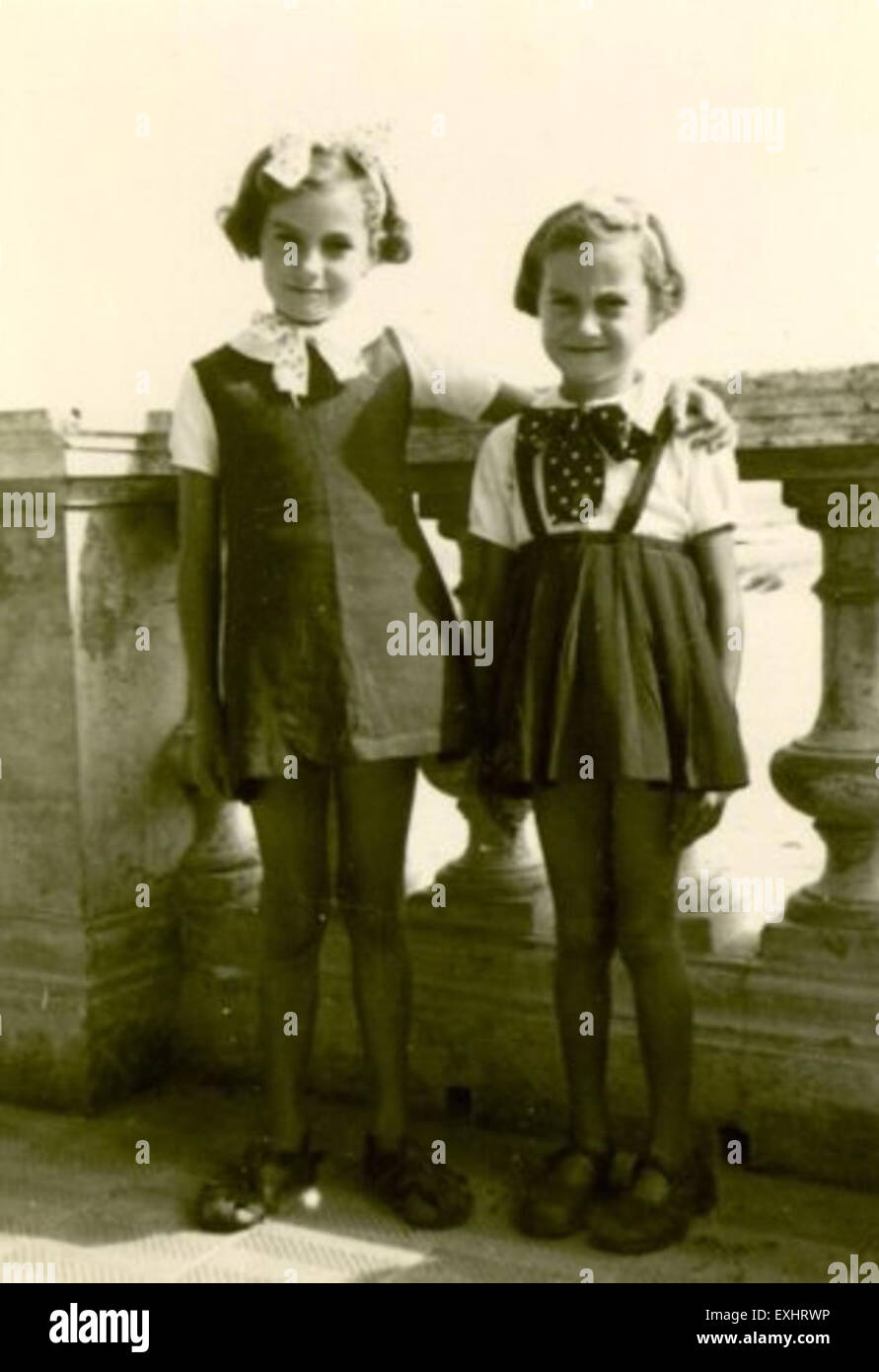 Two Young Girls With Bows Stock Photo