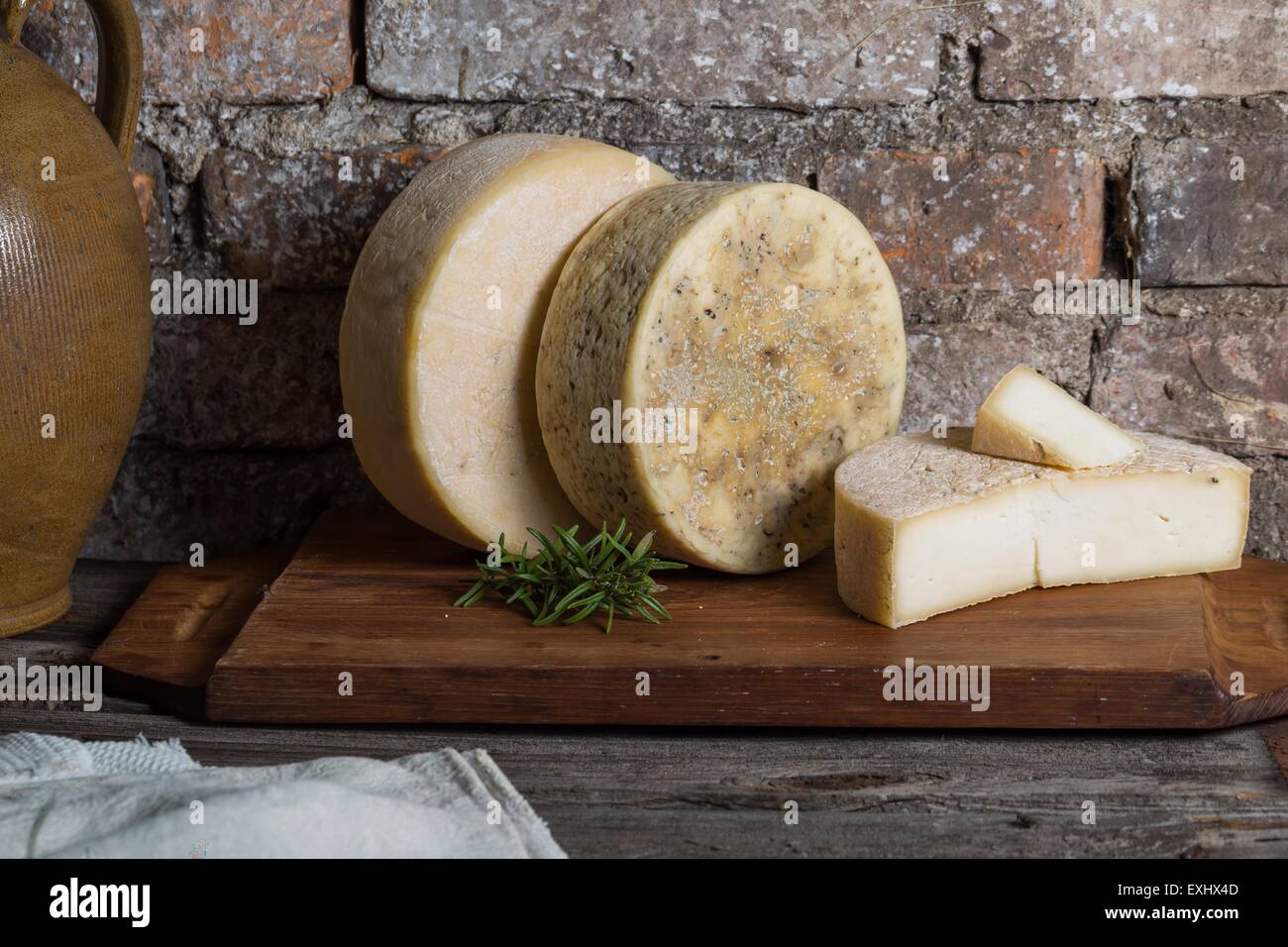 Still life with french goat cheese. Studio shoot with mystic light efect. Stock Photo