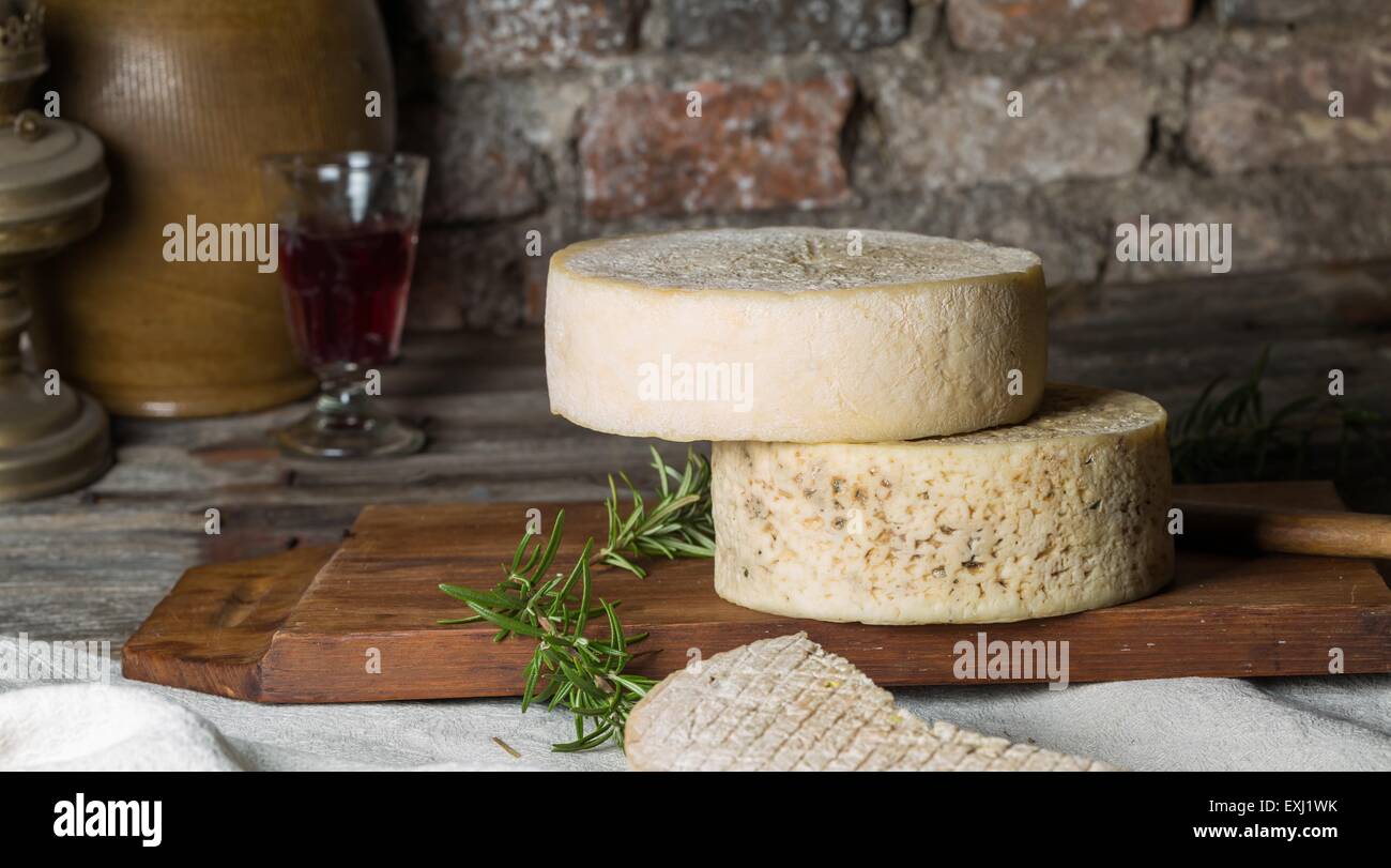 Still life with french goat cheese. Studio shoot with mystic light efect. Stock Photo