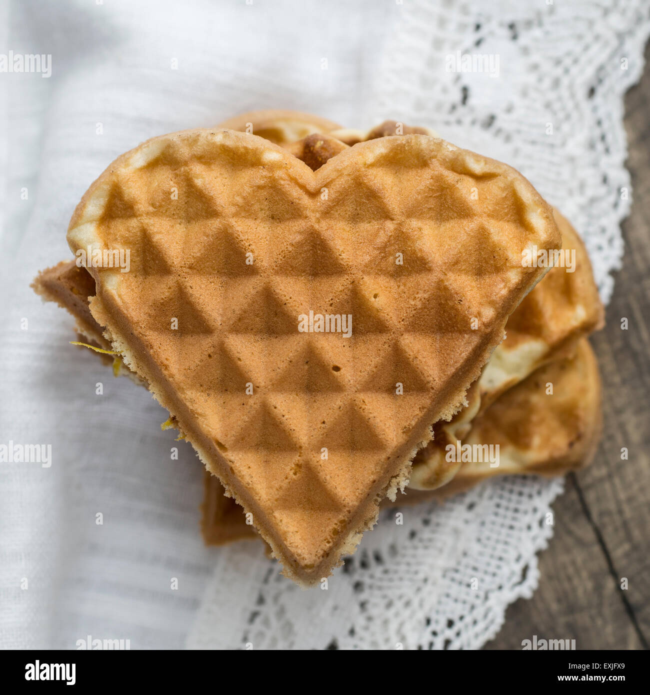 heart shaped waffles on table,from above Stock Photo