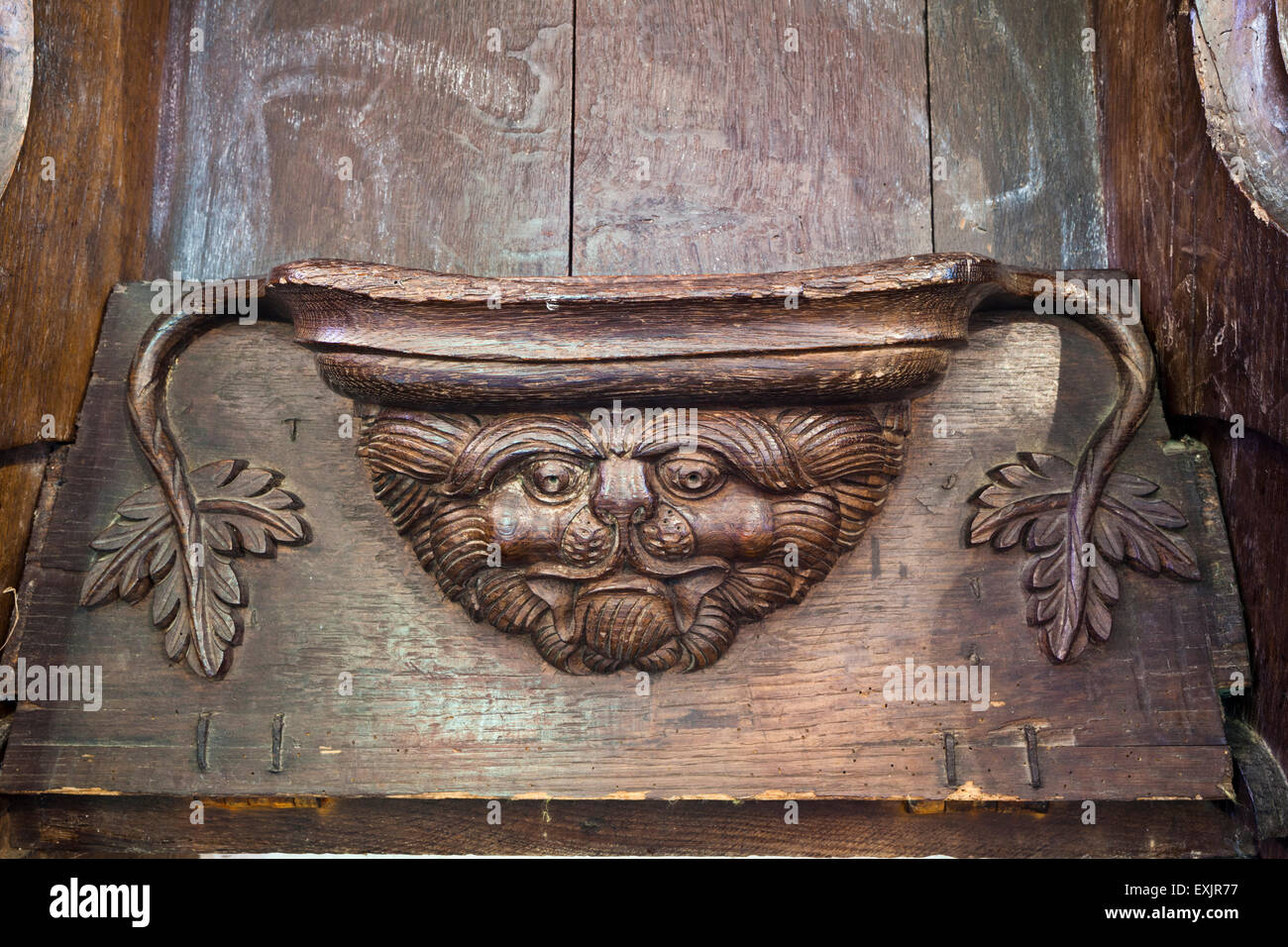 A misericord in St Michaels church in the Cotswold village of Duntisbourne Rouse, Gloucestershire UK Stock Photo