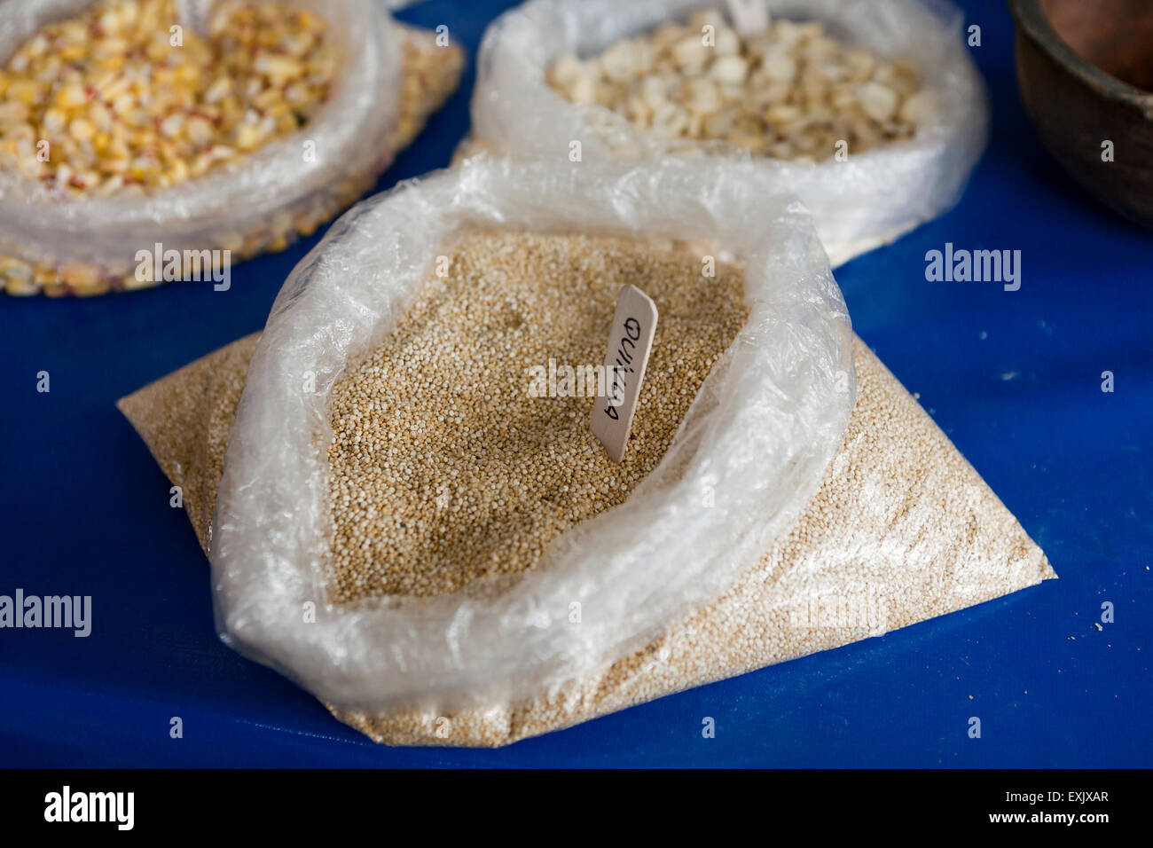 Raw quinoa seeds in bag Stock Photo