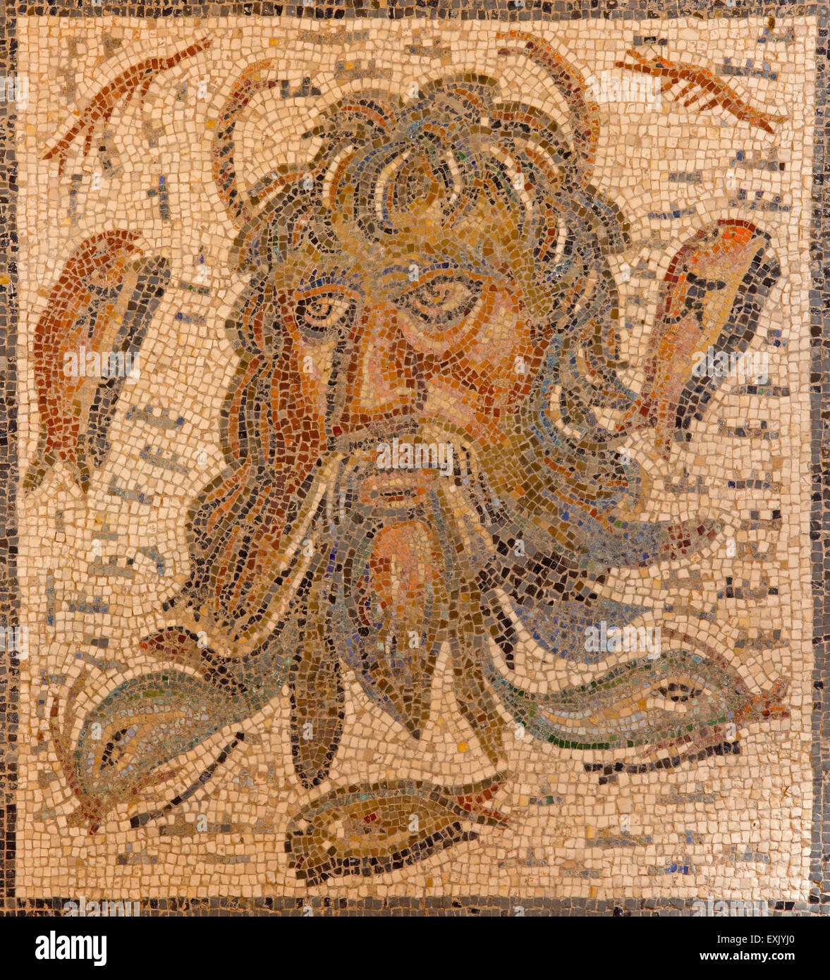 CORDOBA, SPAIN - MAY 25, 2015: The ancient roman mosaic of gon Oceanus from 2 - 3 cent. in Alcazar de los Reyes Cristianos castl Stock Photo