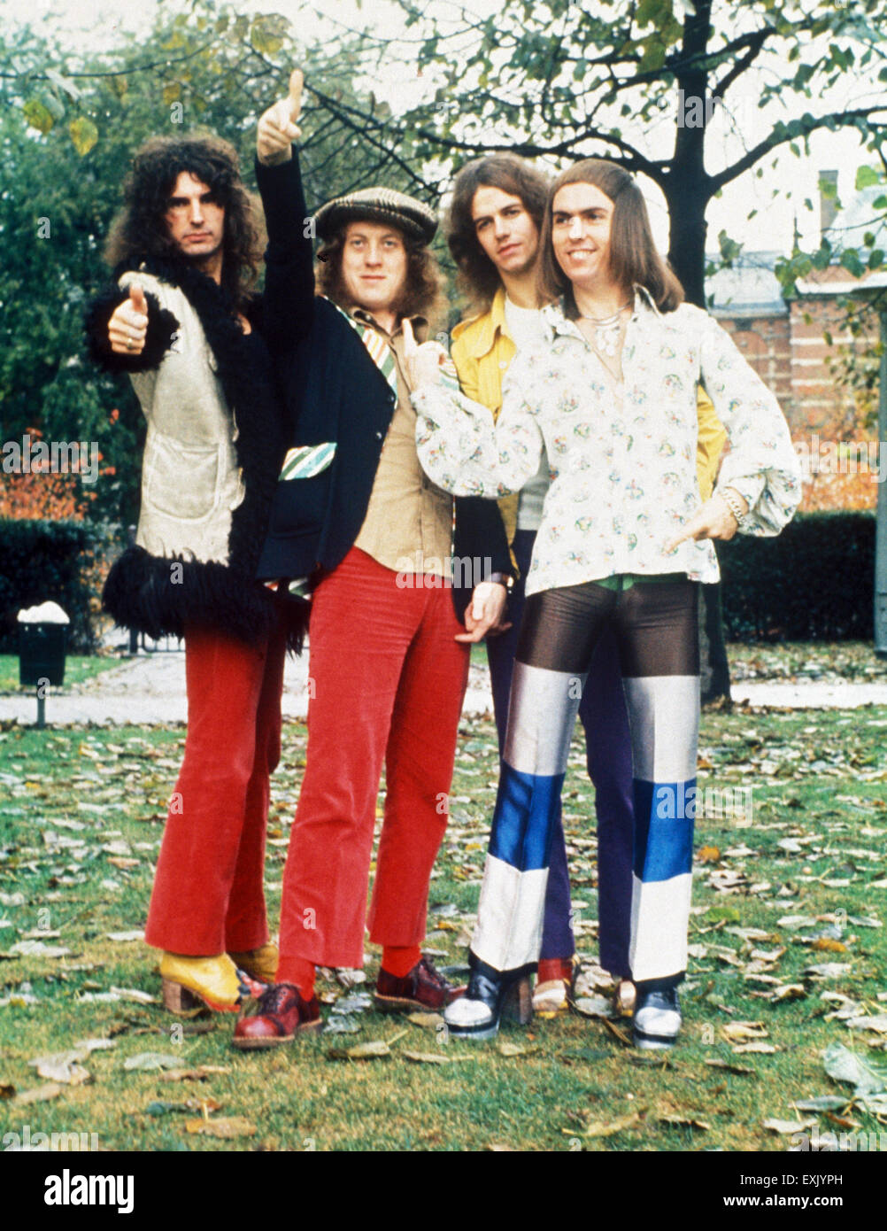 SLADE UK glam rock group about 1974. From left: Don Powell, Noddy Holder, Jim Lea, Dave Hill Stock Photo