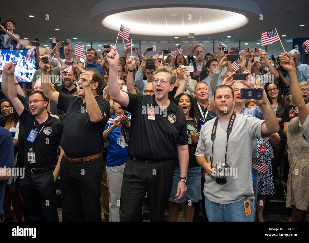 Laurel, Maryland, USA. 14th July, 2015. NASA Planetary Science Division Director Jim Green joins members of the New Horizons science team as they countdown to the closest approach to Pluto during the flyby of the space probe at the Johns Hopkins University Applied Physics Laboratory July 14, 2015 in Laurel, Maryland. Stock Photo