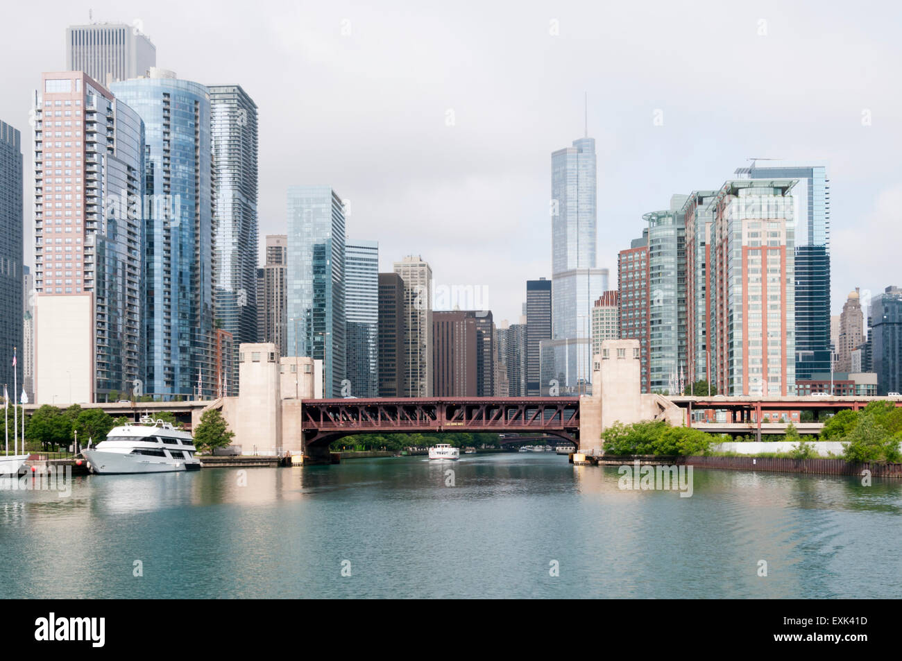 View of skyscrapers along the Chicago River where Lake Shore Drive crosses the double-deck bascule Outer Drive Bridge. Stock Photo