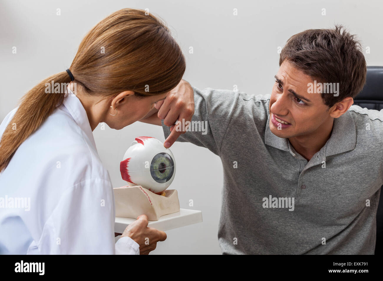 Man learning about the eye Stock Photo - Alamy