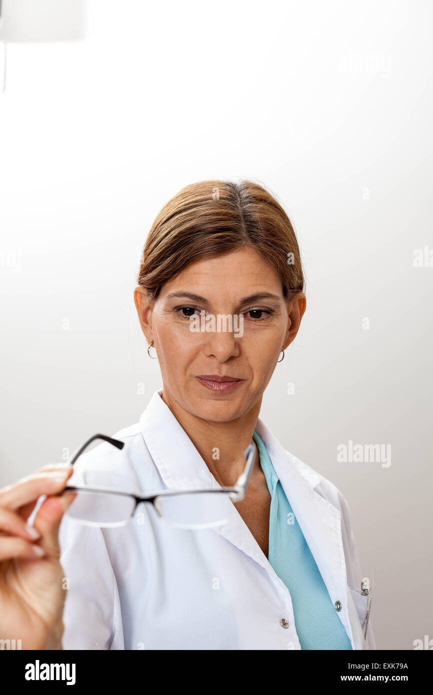 Ophthalmologist doing her job Stock Photo Alamy