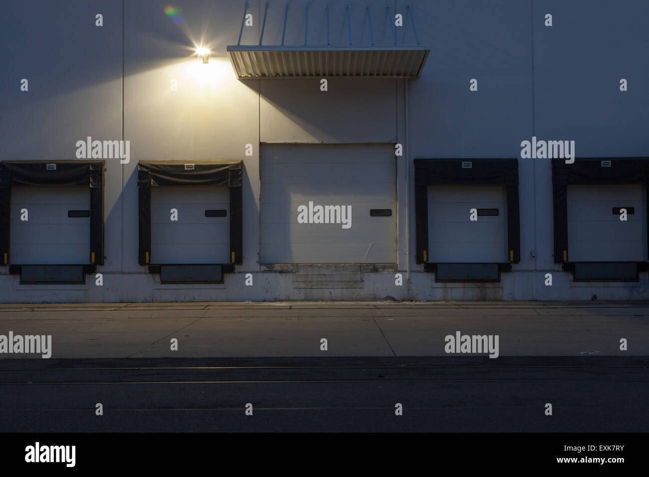 trucking loading docks at night Stock Photo