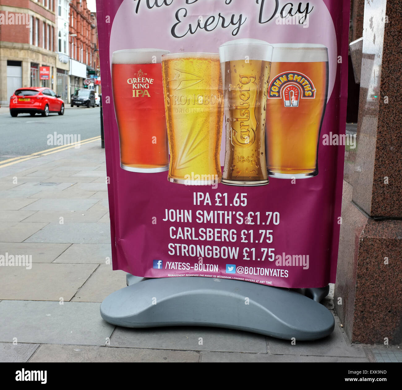 Cheap beer lager and cider prices sign in the North West, England UK Stock Photo