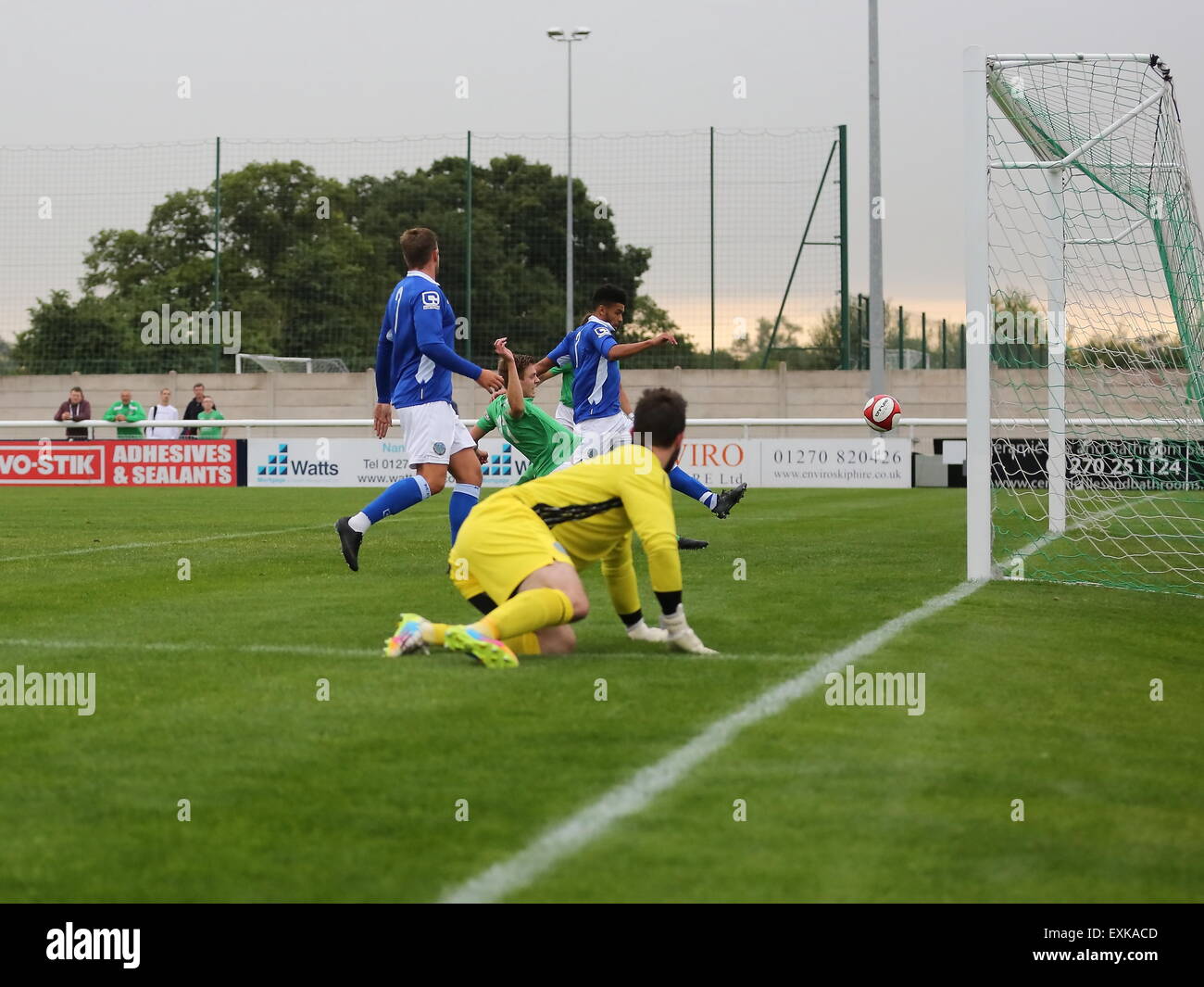 Nantwich, UK. 14th July, 2015. Lewis Short gets on the end of a cross from Steve Jones to get the ball home to make it 1-0 to Nantwich Town during the pre-season friendly match at The Weaver Stadium, Nantwich. Credit:  SJN/Alamy Live News Stock Photo