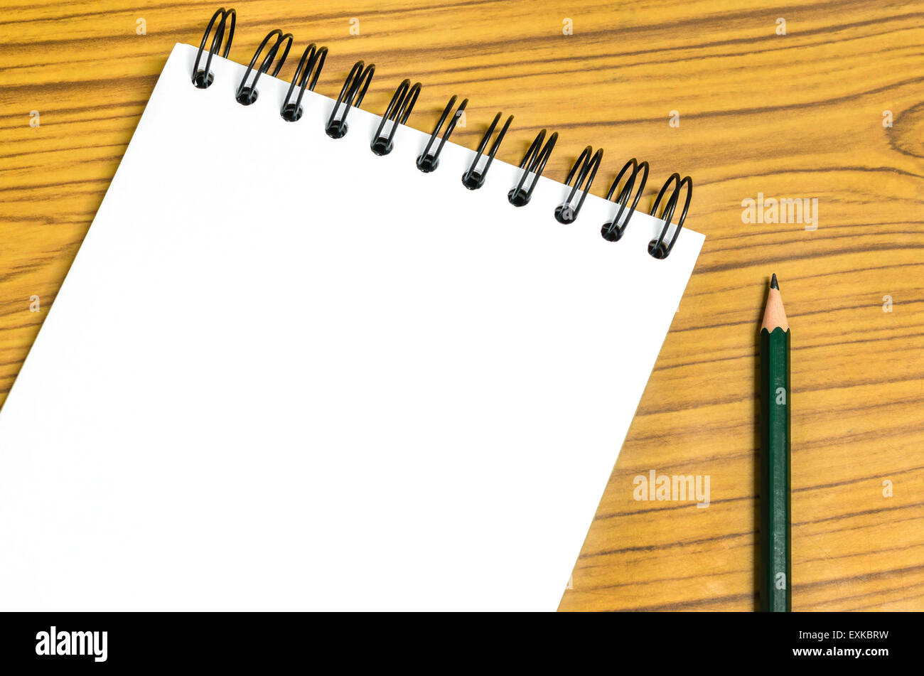 Blank paper and pencil on the wooden table Stock Photo - Alamy