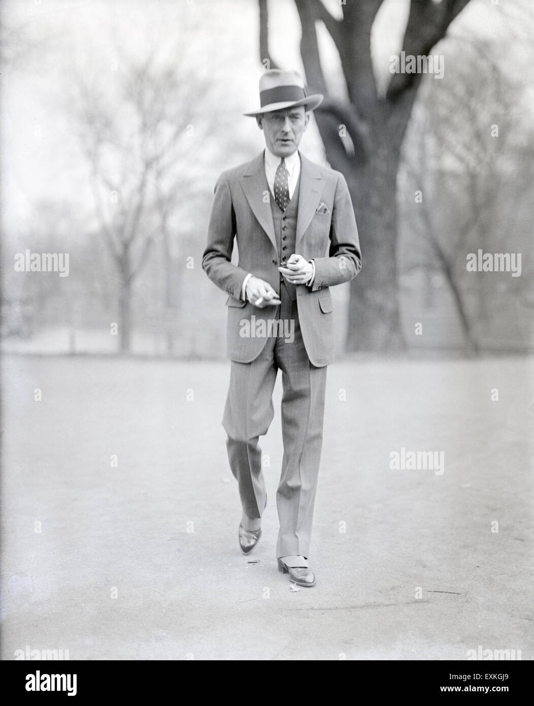 Antique c1930 photograph, Jimmy Walker in Boston, Massachusetts. James John Walker, often known as Jimmy Walker and colloquially as Beau James (1881-1946), was Mayor of New York City from 1926 to 1932. A flamboyant politician, he was a liberal Democrat and part of the powerful Tammany Hall machine. During a corruption scandal he was forced to resign. Stock Photo