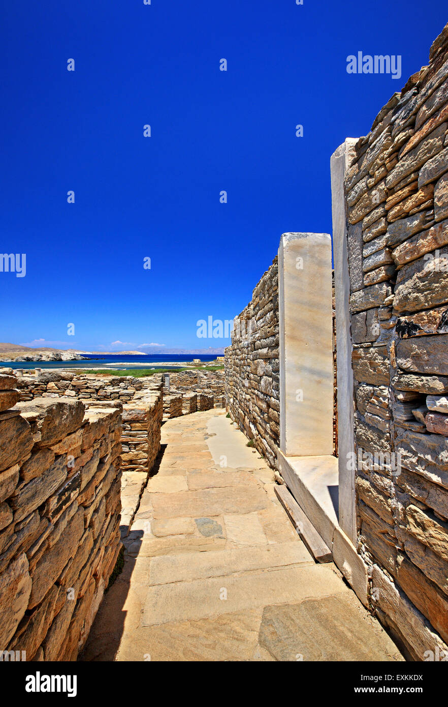 Walking around the ancient town in the archaeological site of the "sacred" island of Delos. Cyclades, Greece. Stock Photo