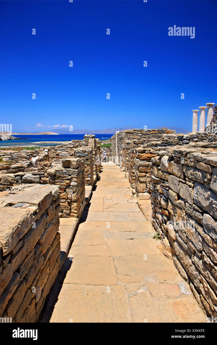 Walking around the ancient town in the archaeological site of the 'sacred' island of Delos. Cyclades, Greece. Stock Photo