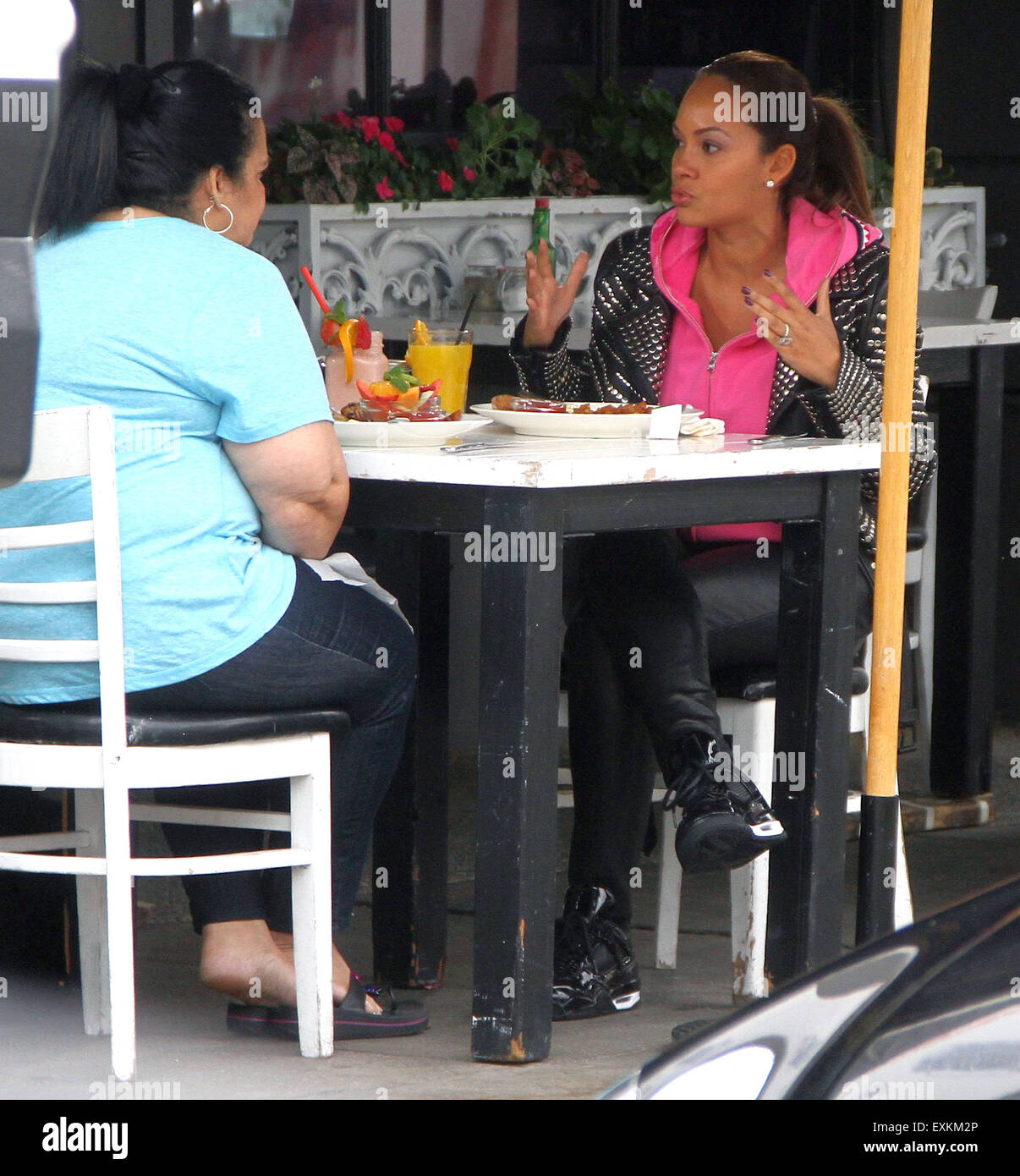 Basketball Wives Evelyn Lozada films her reality show at a restaurant